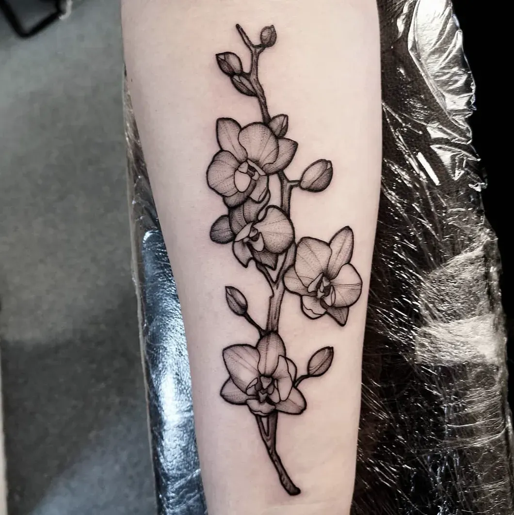 The Hidden Meanings Behind Orchid Tattoo Designs