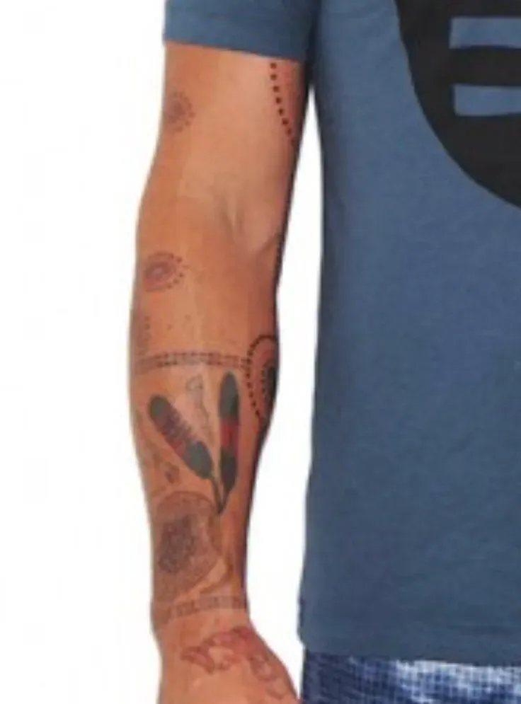 Why Fans Look to Xavier Rudd Tattoo Designs