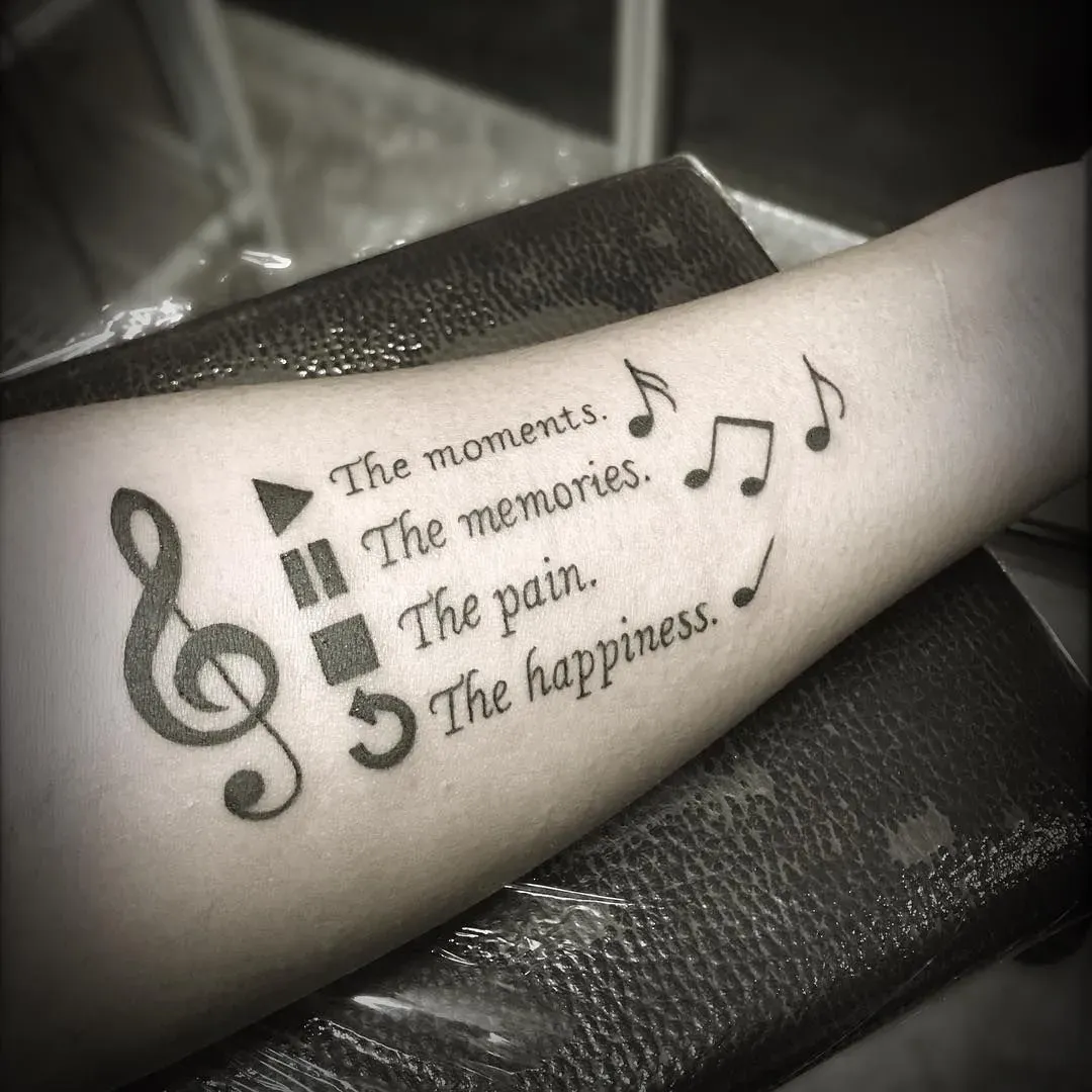Why Ink Your Soundtrack? The Meaning Behind Music Tattoo Designs
